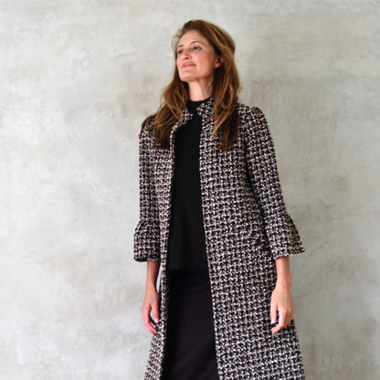 the delany coat in ivory, black, brown and copper bouclé image 9