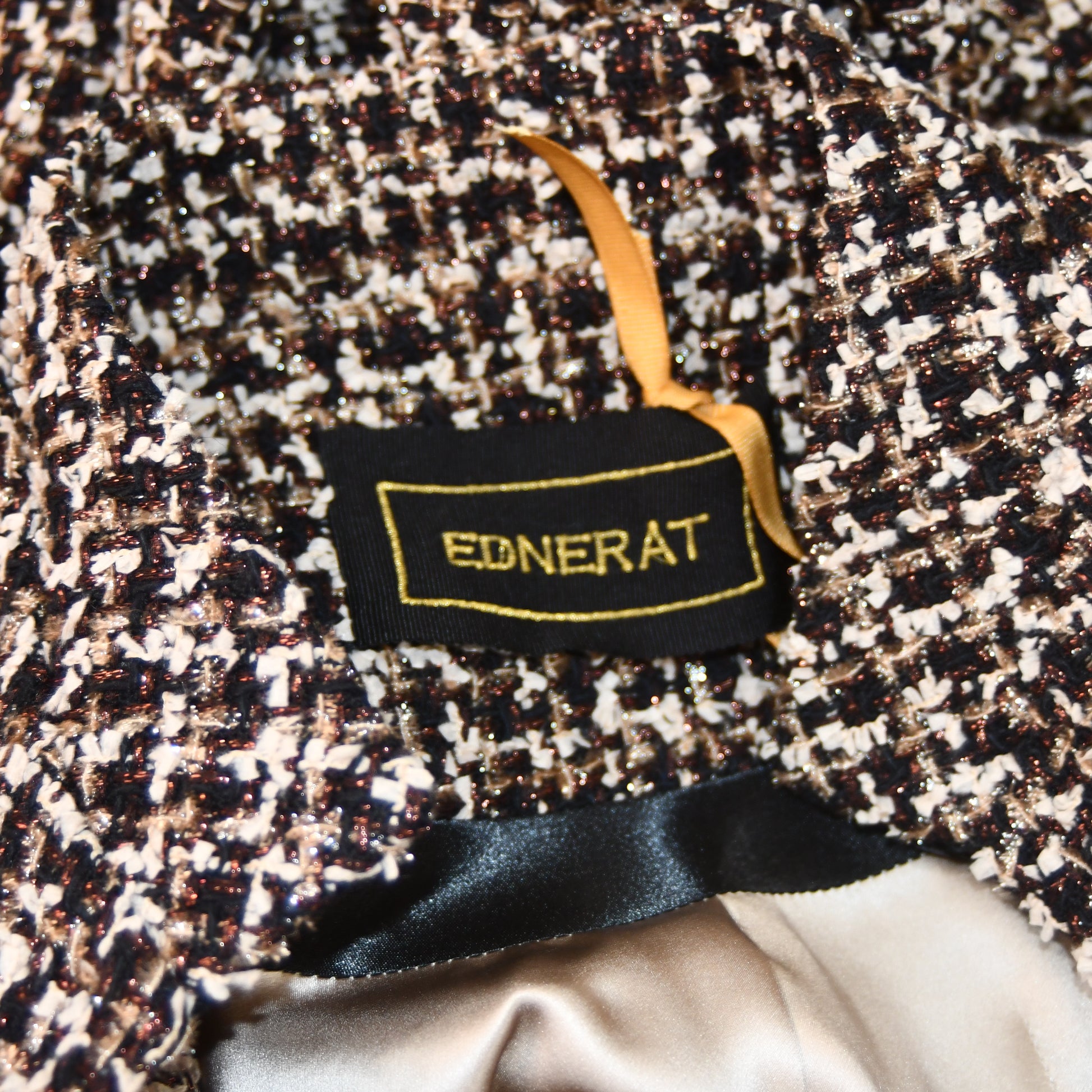 the delany coat in ivory, black, brown and copper bouclé image 11