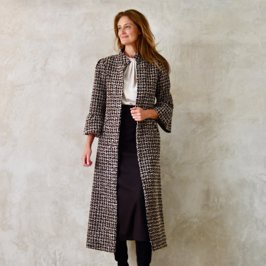 the delany coat in ivory, black, brown and copper bouclé image 0